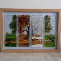 Fused glass 4 seasons  tree Fused glass 4 seasons in an open frame