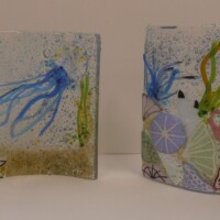 Coral reef fused glass arch and wave Coral reef fused glass arch and wave
