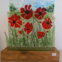 Freestanding fused glass poppy panel Freestanding fused glass poppy panel
